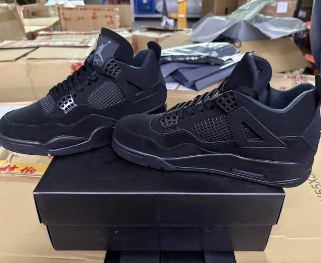 Black mesh basketball sneakers with molded side supports