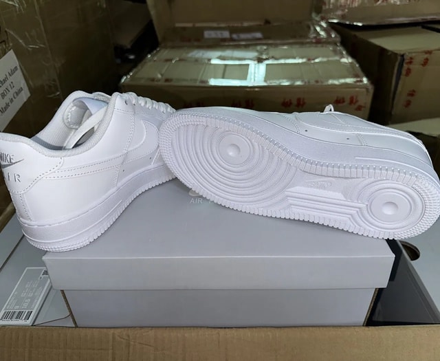 Nike Air Force 1 triple white low-top sneakers